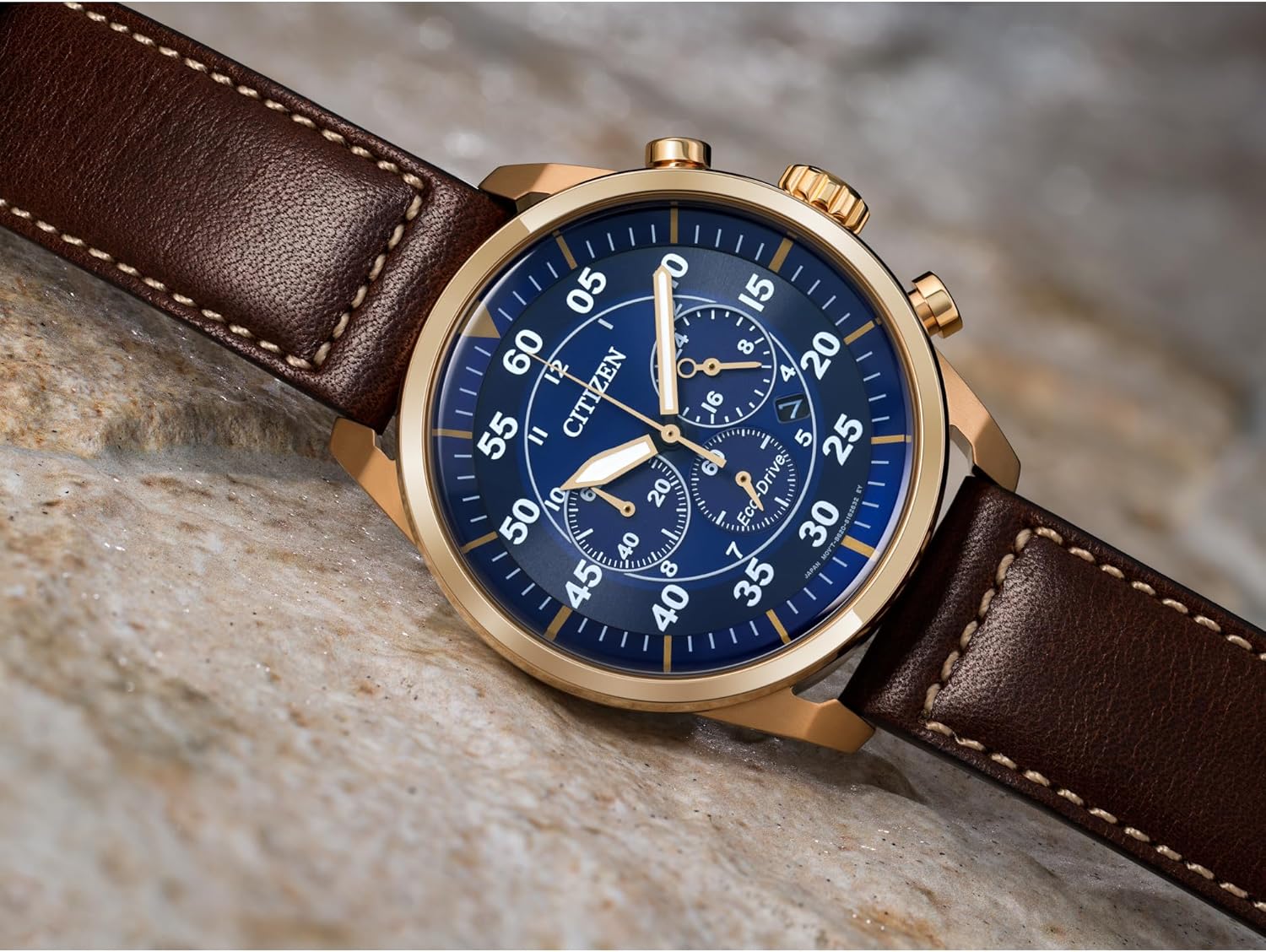 Citizen Men's Eco-Drive Chronograph Sport Casual Avion Watch, Rose Gold Stainless Steel with Brown Leather Strap, Blue Dial (Model: CA4213-18L)